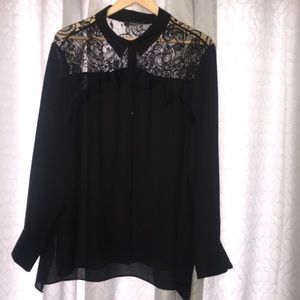 Black blouse with lace embellishments